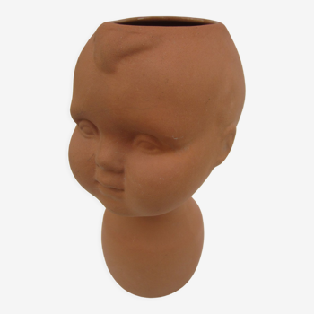 Terracotta vase: child's head