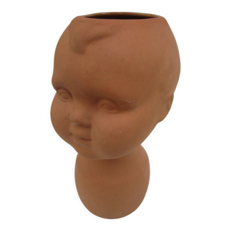 Terracotta vase: child's head