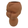 Terracotta vase: child's head