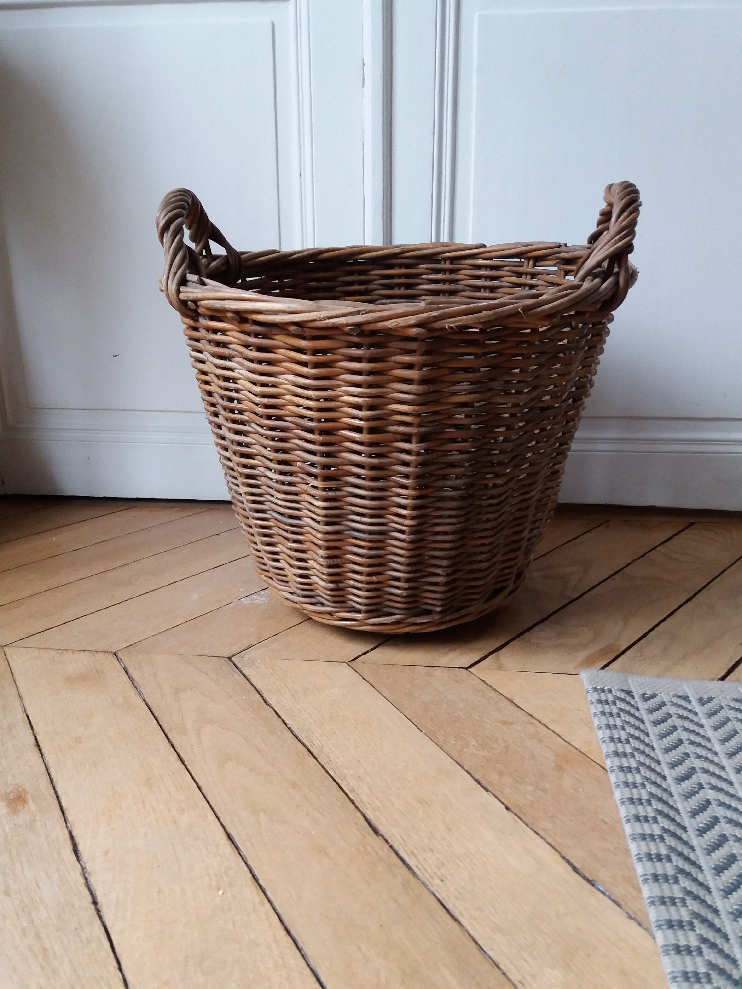 Antique wicker laundry basket