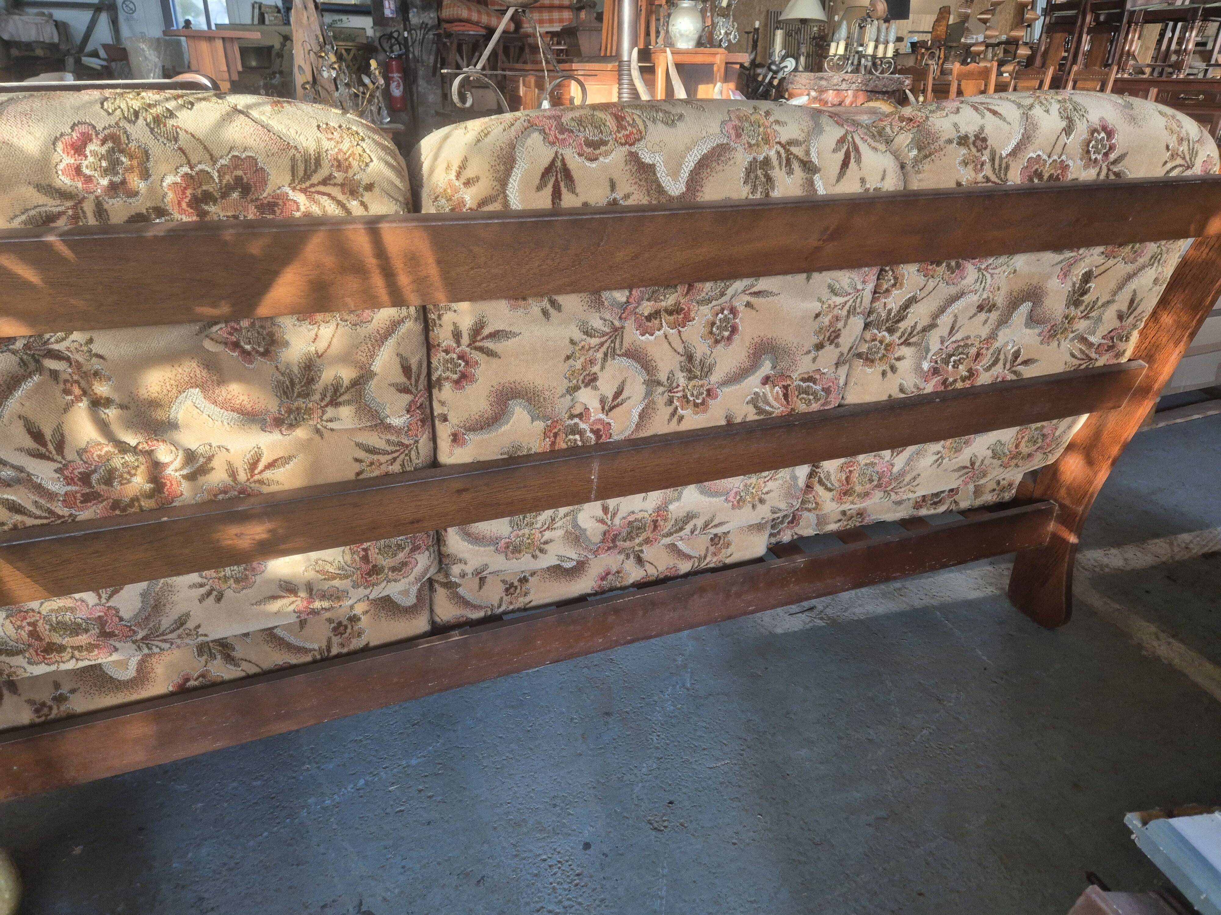 Rustic solid oak sofa with floral decoration