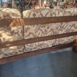 Rustic solid oak sofa with floral decoration