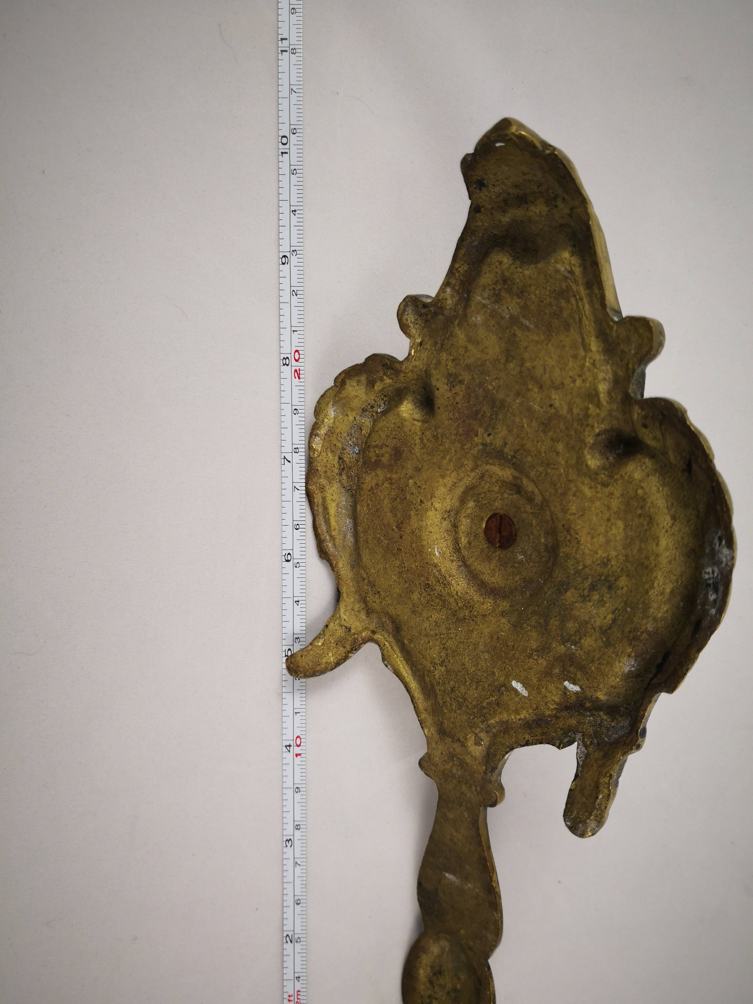 bronze or brass candle holder, cellar level