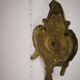 bronze or brass candle holder, cellar level