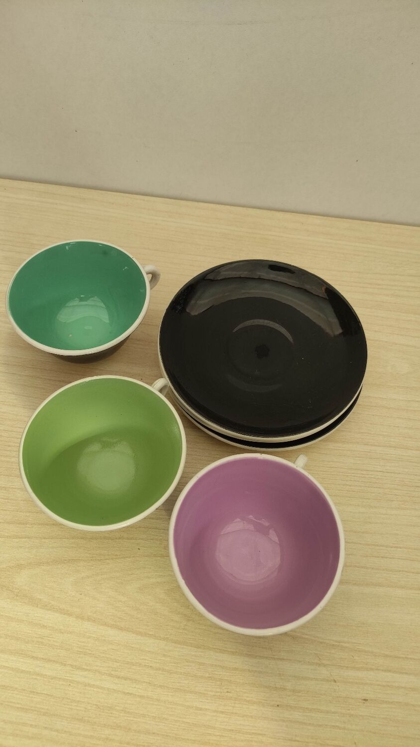 Coffee cups with saucers