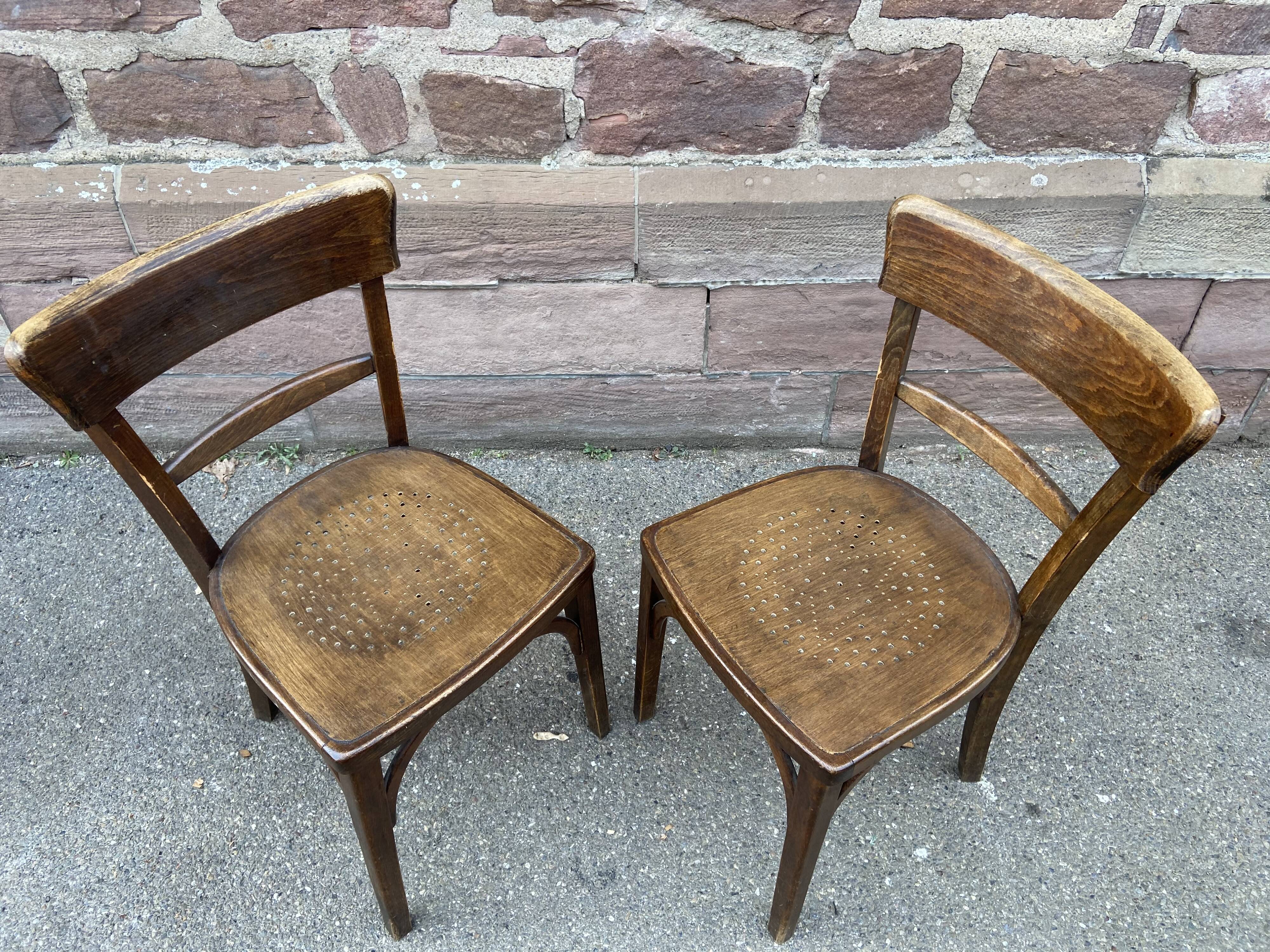Pair of curved wooden brasserie chair