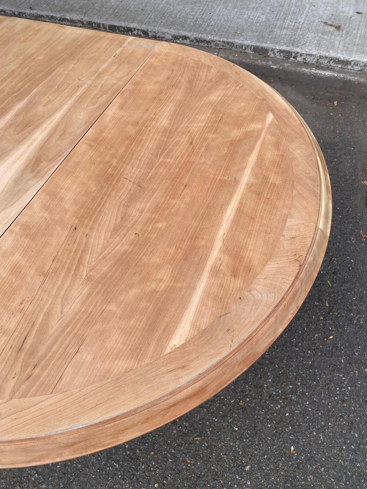 Round extendable farmhouse dining table, stripped, Louis XIII style from the 1960s.