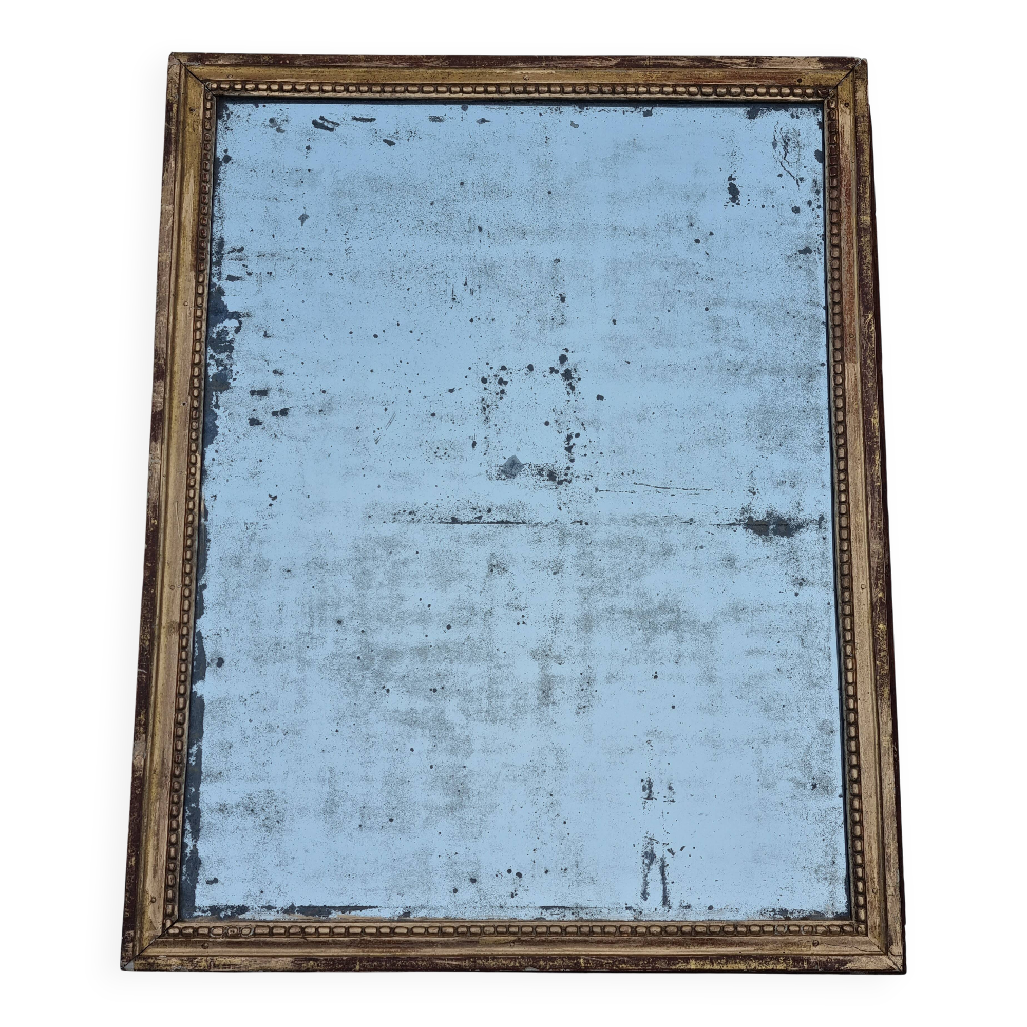 Antique mirror in a gilded wooden frame in the Louis XVI style, 19th century, 62x78 cm.
