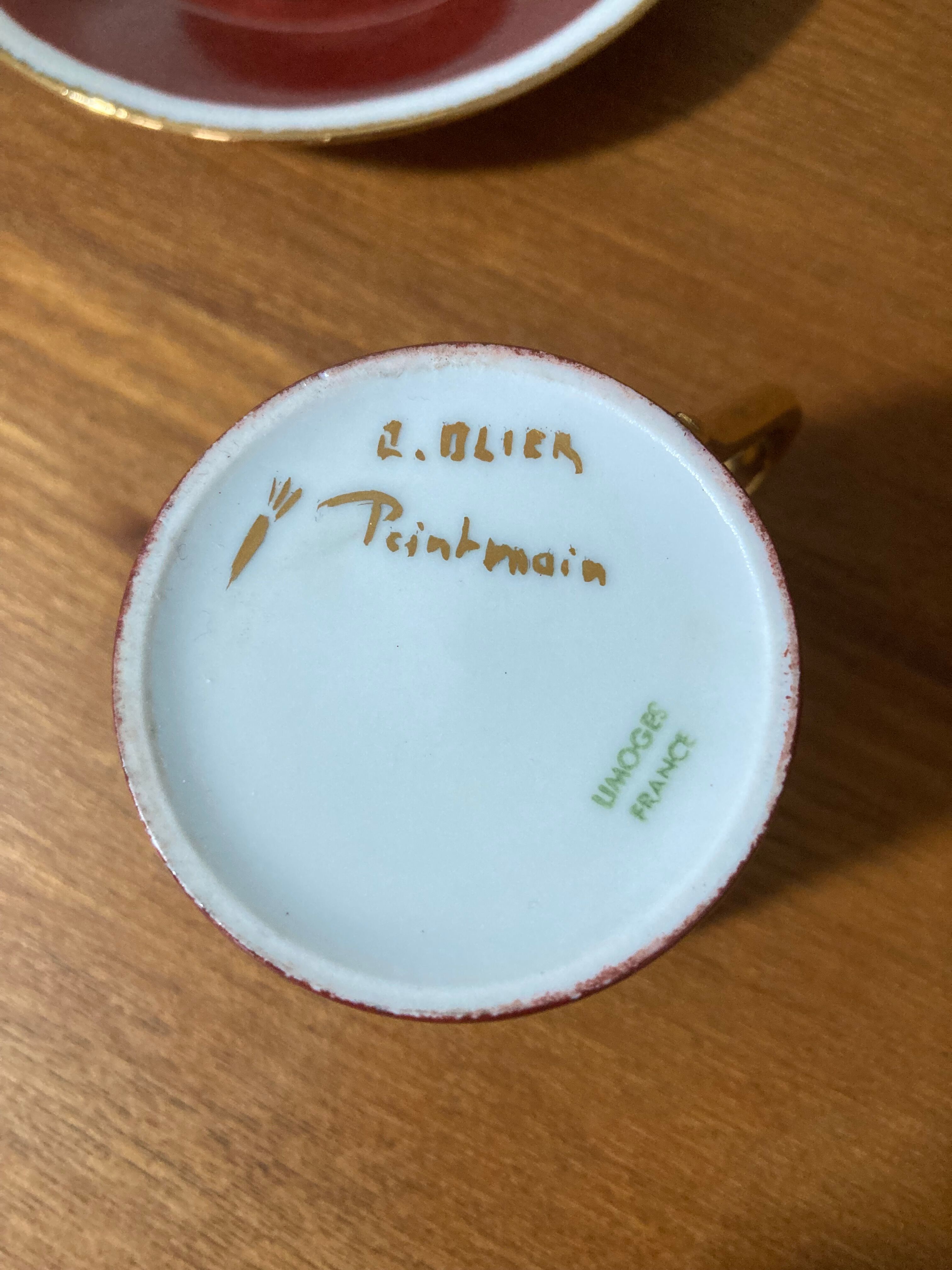 Hand-painted Limoges porcelain cup and saucer signed R. Blier