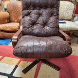 Scandinavian tilting and rotating armchair