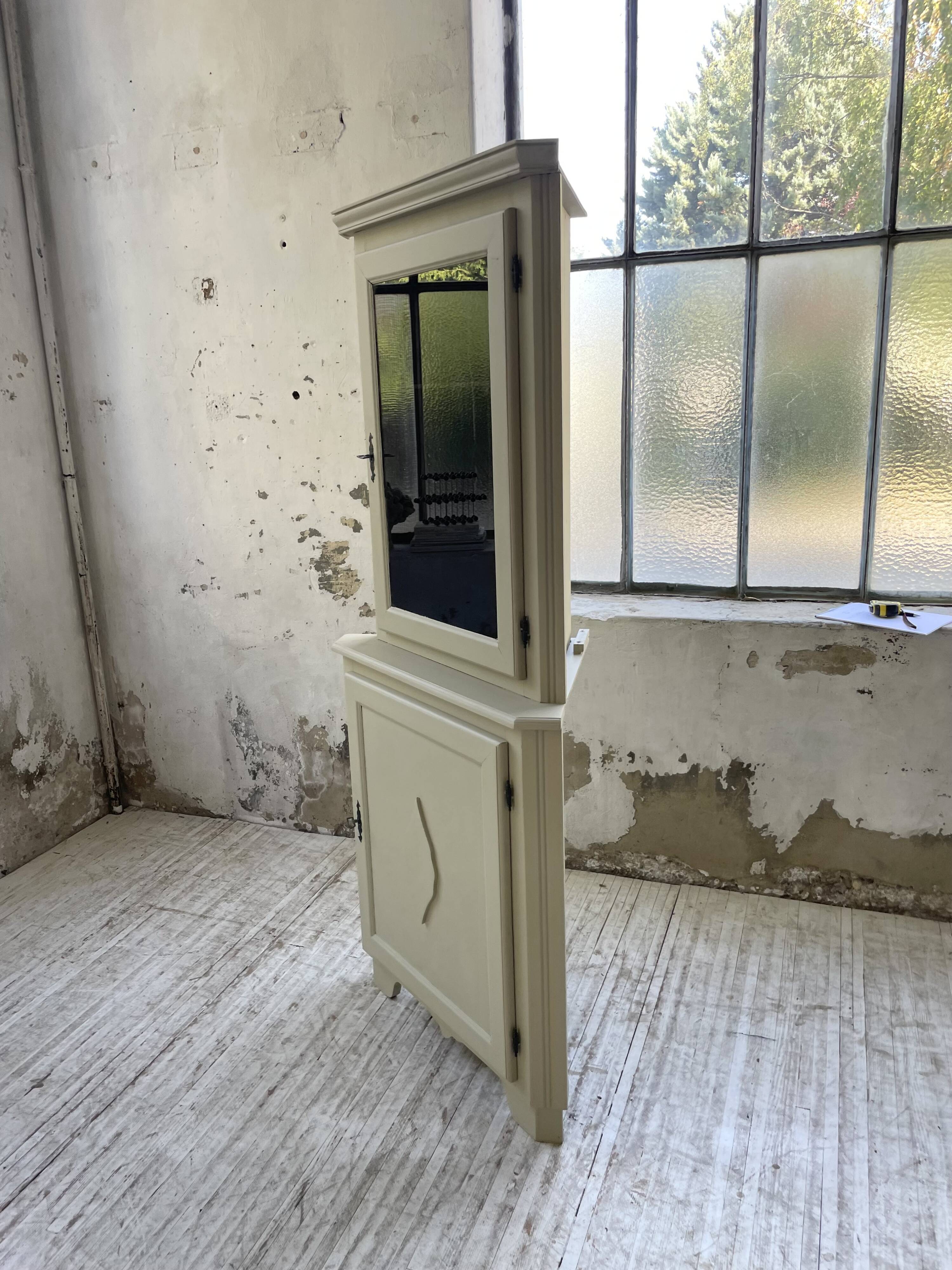 Corner display cabinet from the 1950s