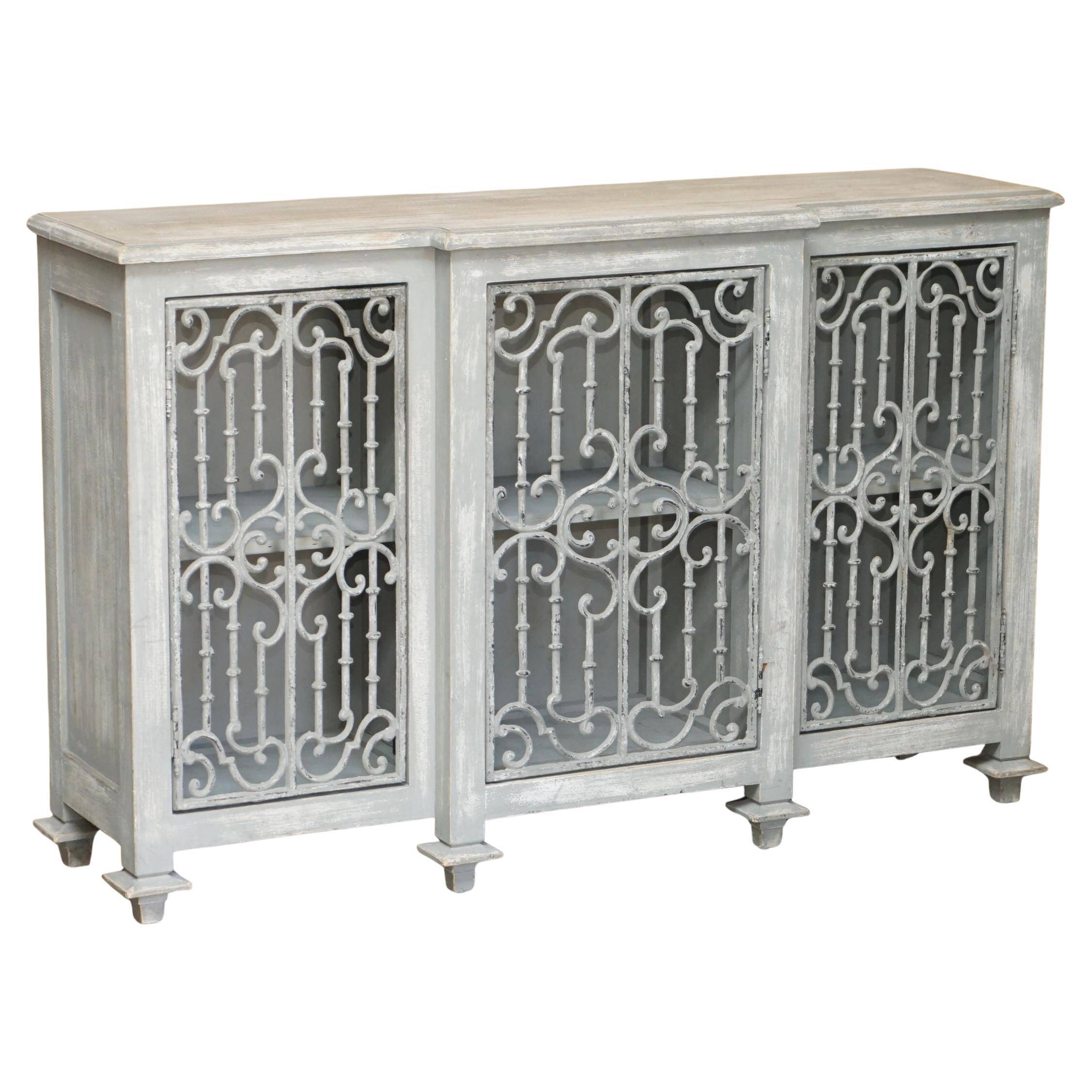 Vintage sideboard with wrought iron doors