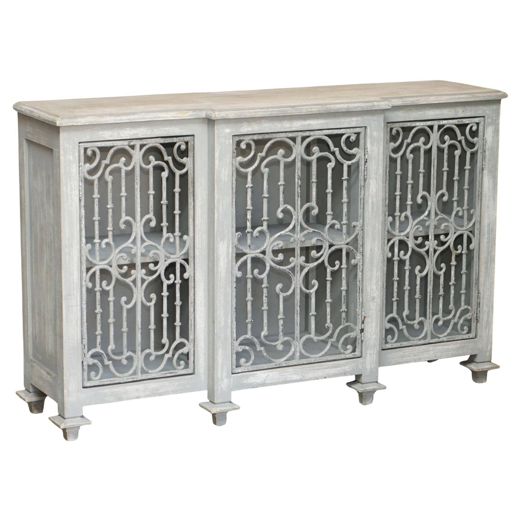 Vintage sideboard with wrought iron doors