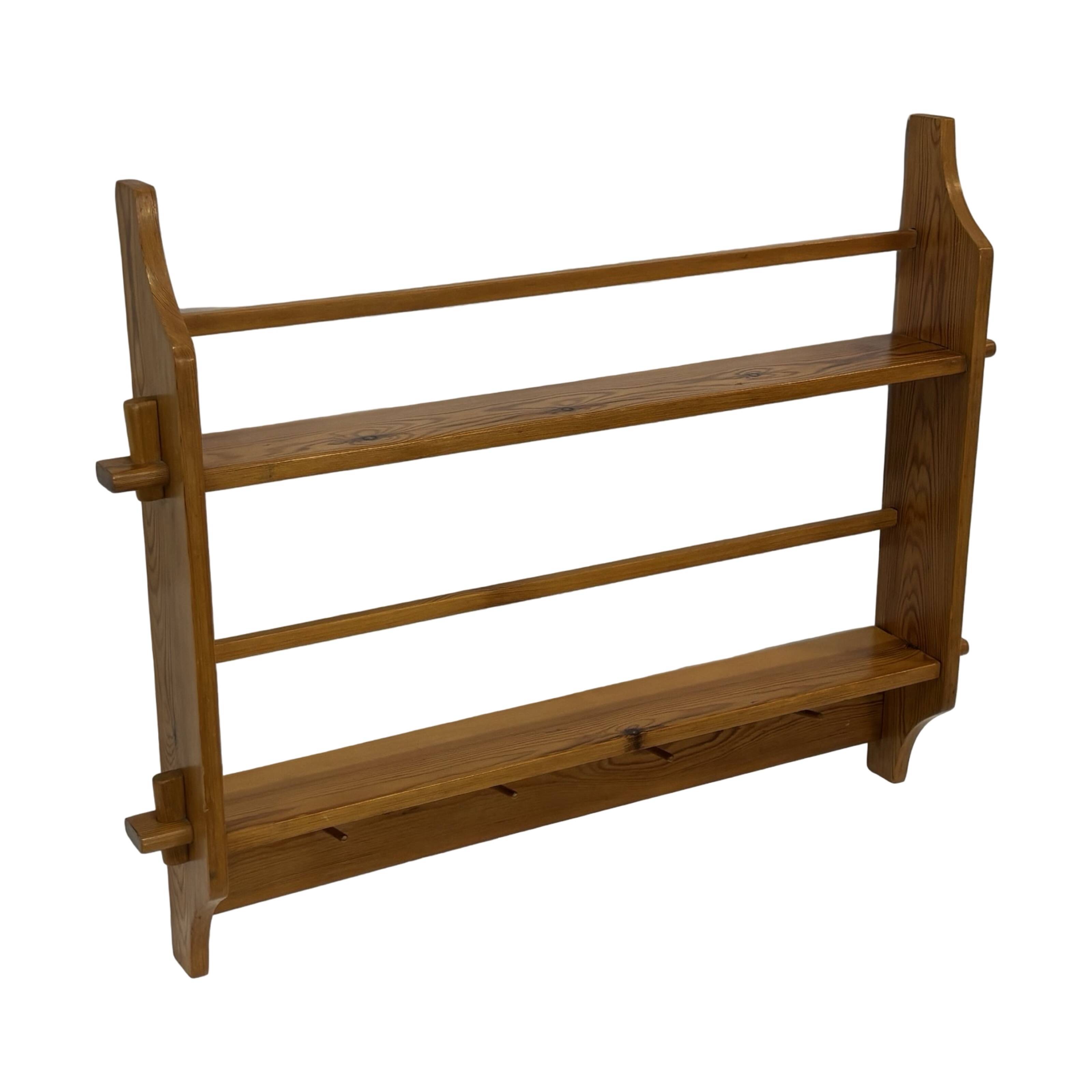 Vintage wooden wall shelve rack bookshelf in pinewood minimalist design