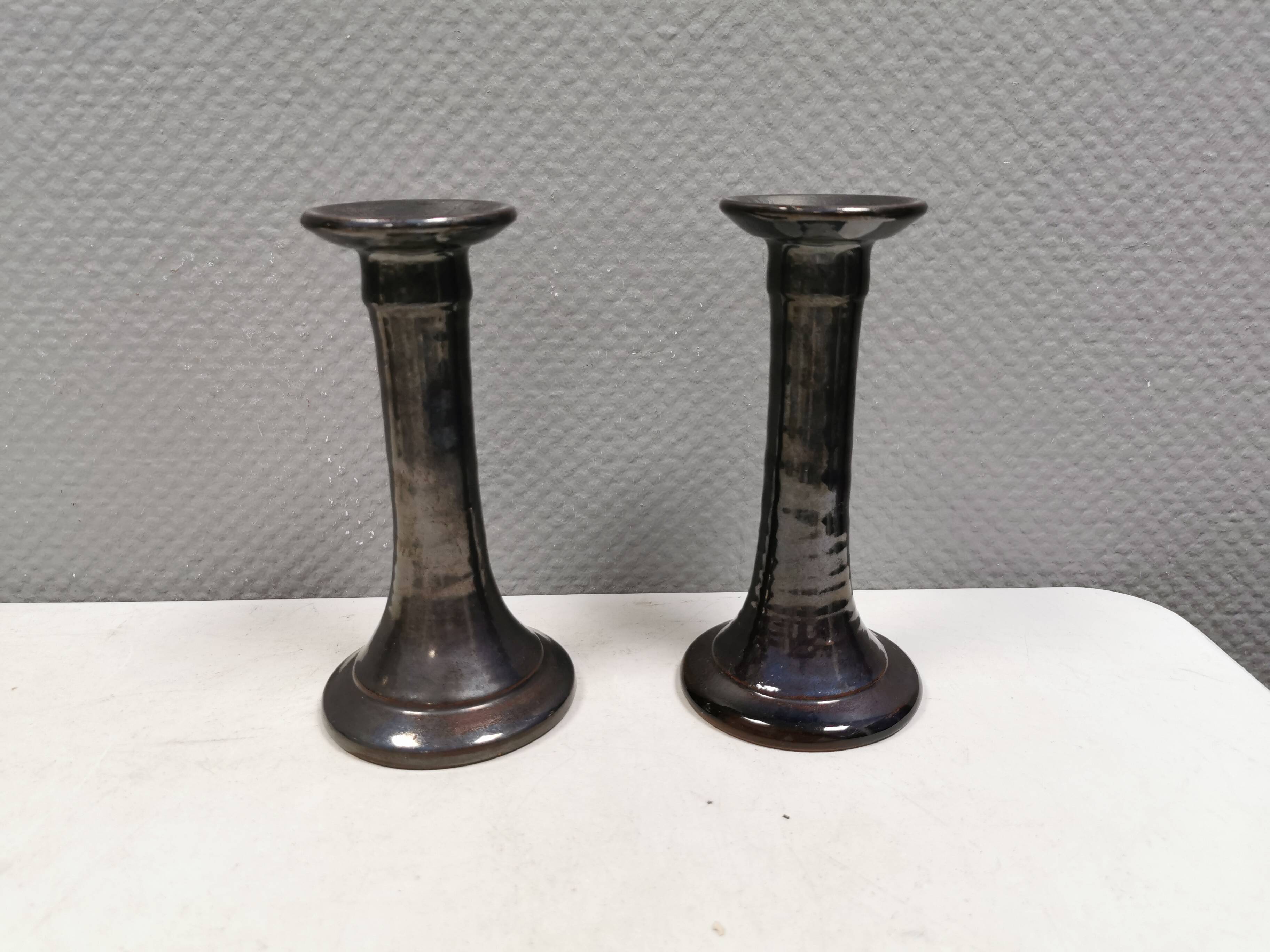 A set of ceramic candlesticks in bluish metallic glaze, Denmark 1980s