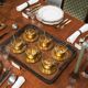 Mid-century tea service in patinated brass and glass