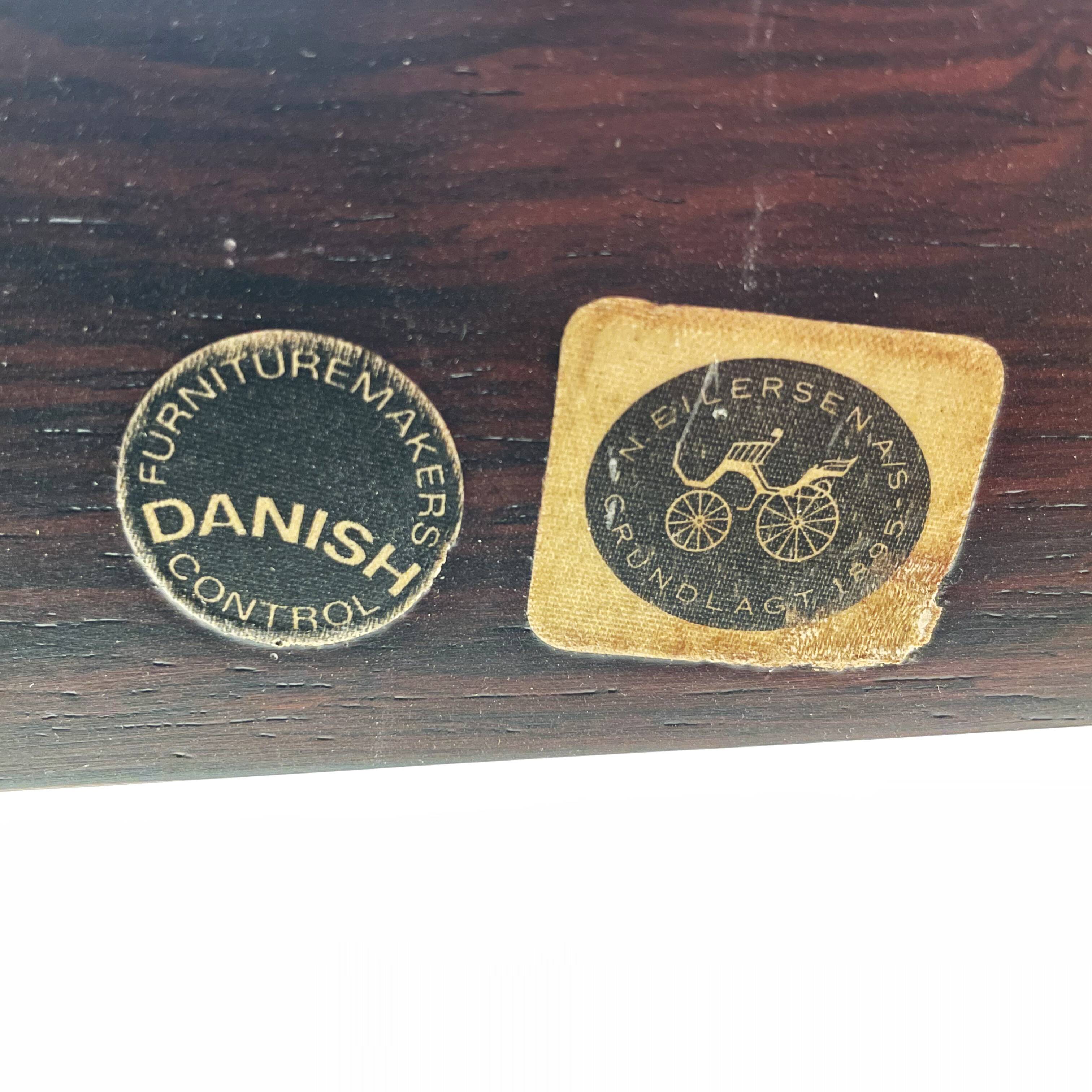 Fauteuil et ottoman en palissandre et cuir par Erik Wørts pour Niels Eilersen, Danemark 1960