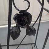 Pink-decorated iron umbrella door.