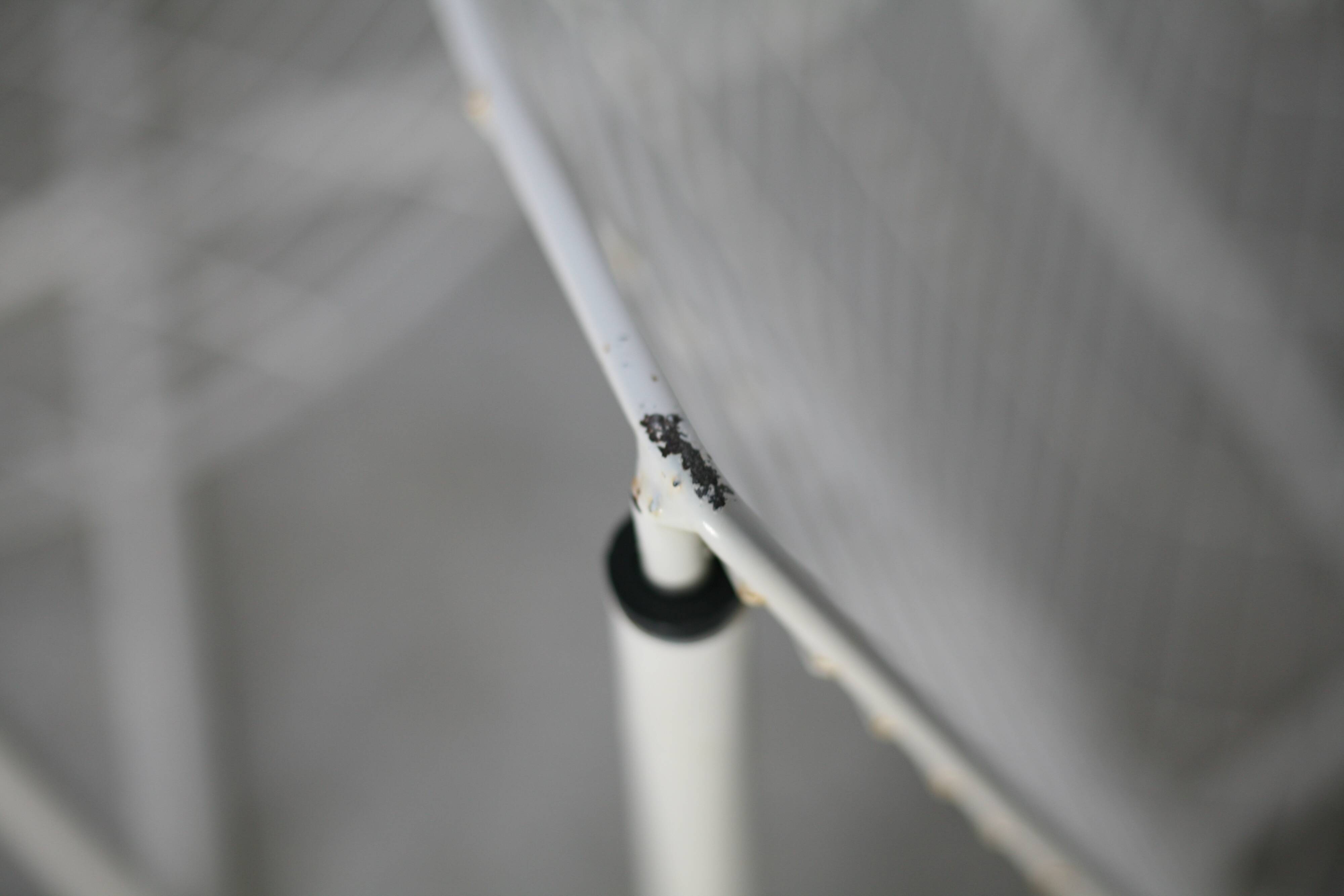 Pair of white lacquered steel rod armchairs. Circa 1985