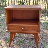 Wooden bedside table with compass feet