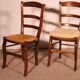 série de 8 chaises paillées en merisier