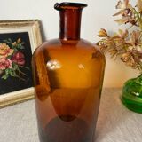 Large amber glass apothecary bottle with spout
