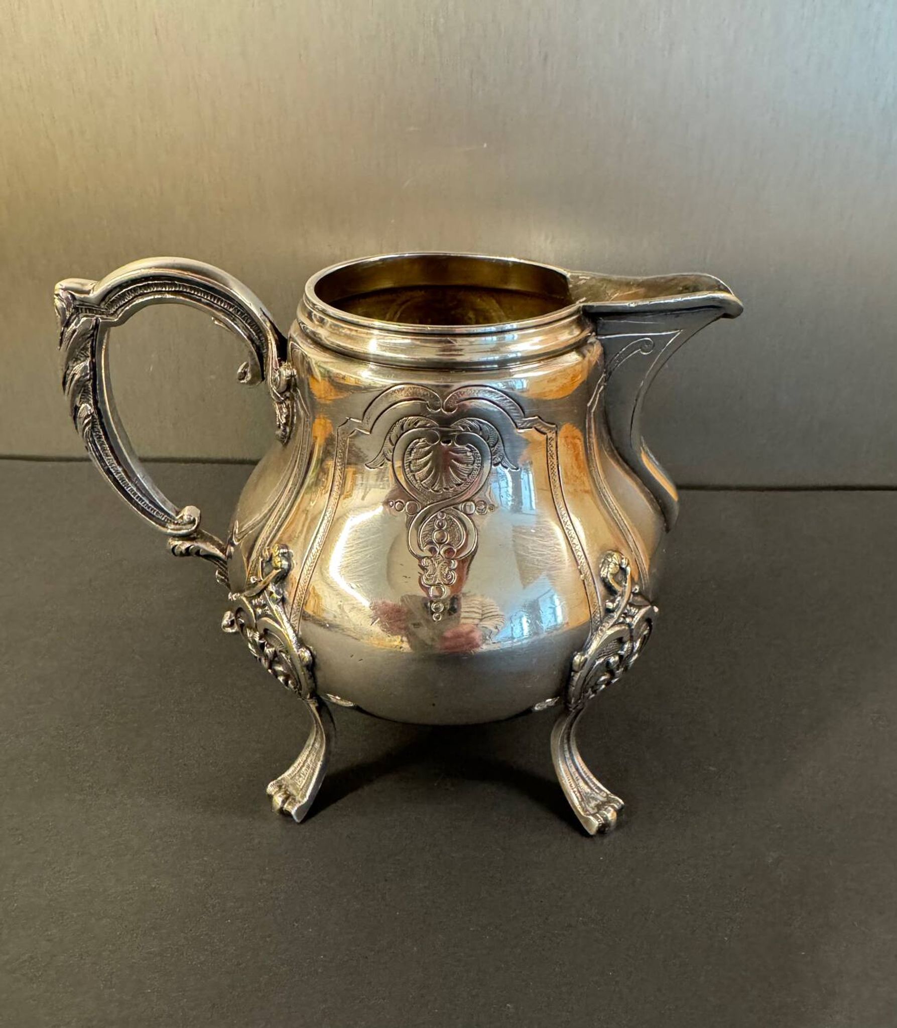 Antique silver-plated metal milk jug – Rococo style, chased decoration, early
