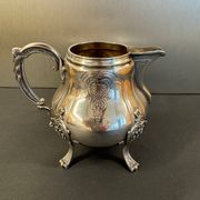 Antique silver-plated metal milk jug – Rococo style, chased decoration, early
