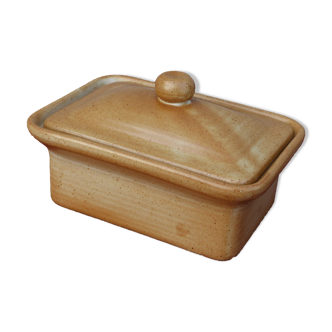 Butter maker in "sandstone village france"