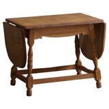 Danish mid-century folding side table in oak, Henning Kjærnulf, 1960s.