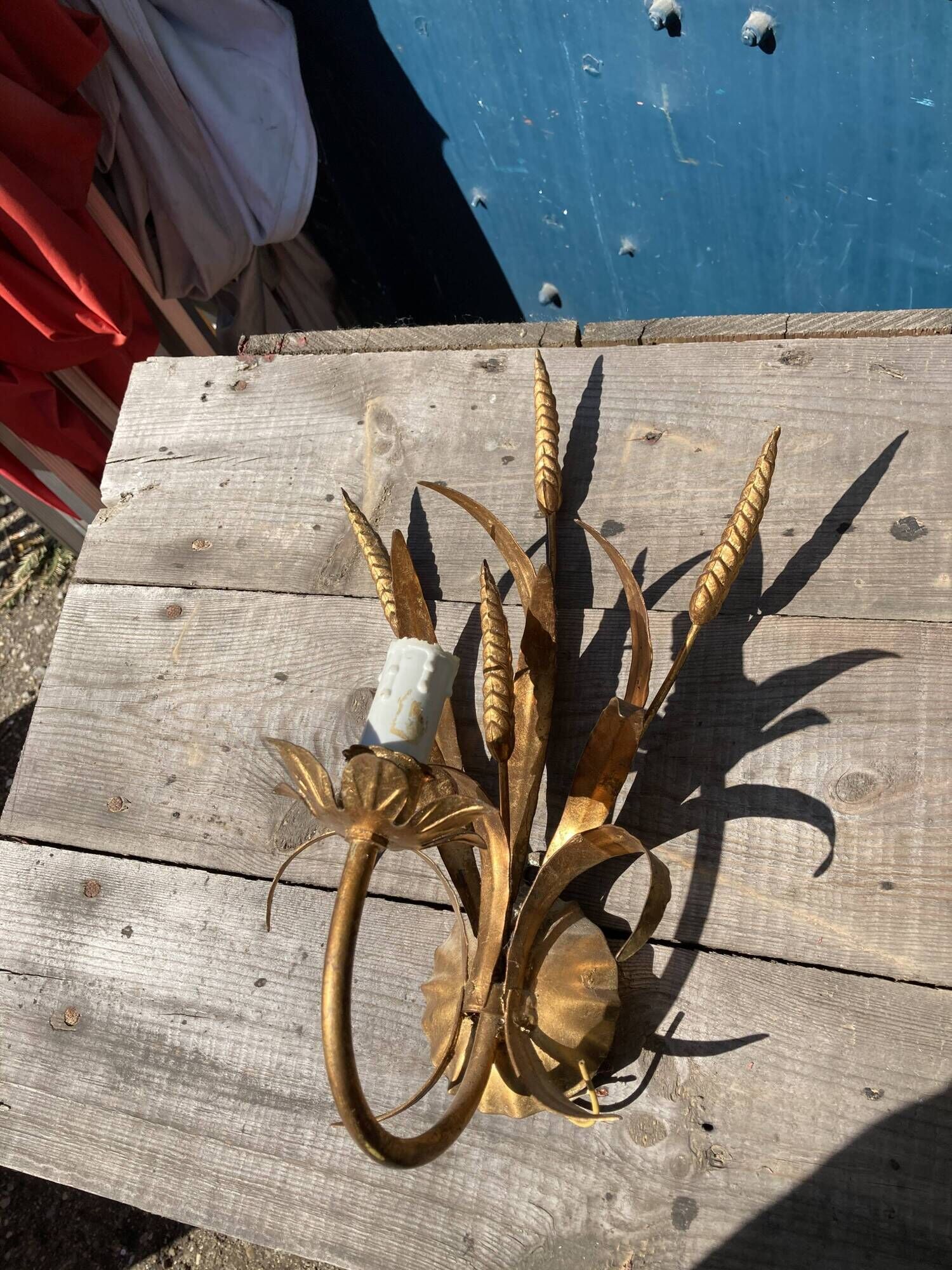 Pair of gold metal sconces decorated with wheat cob