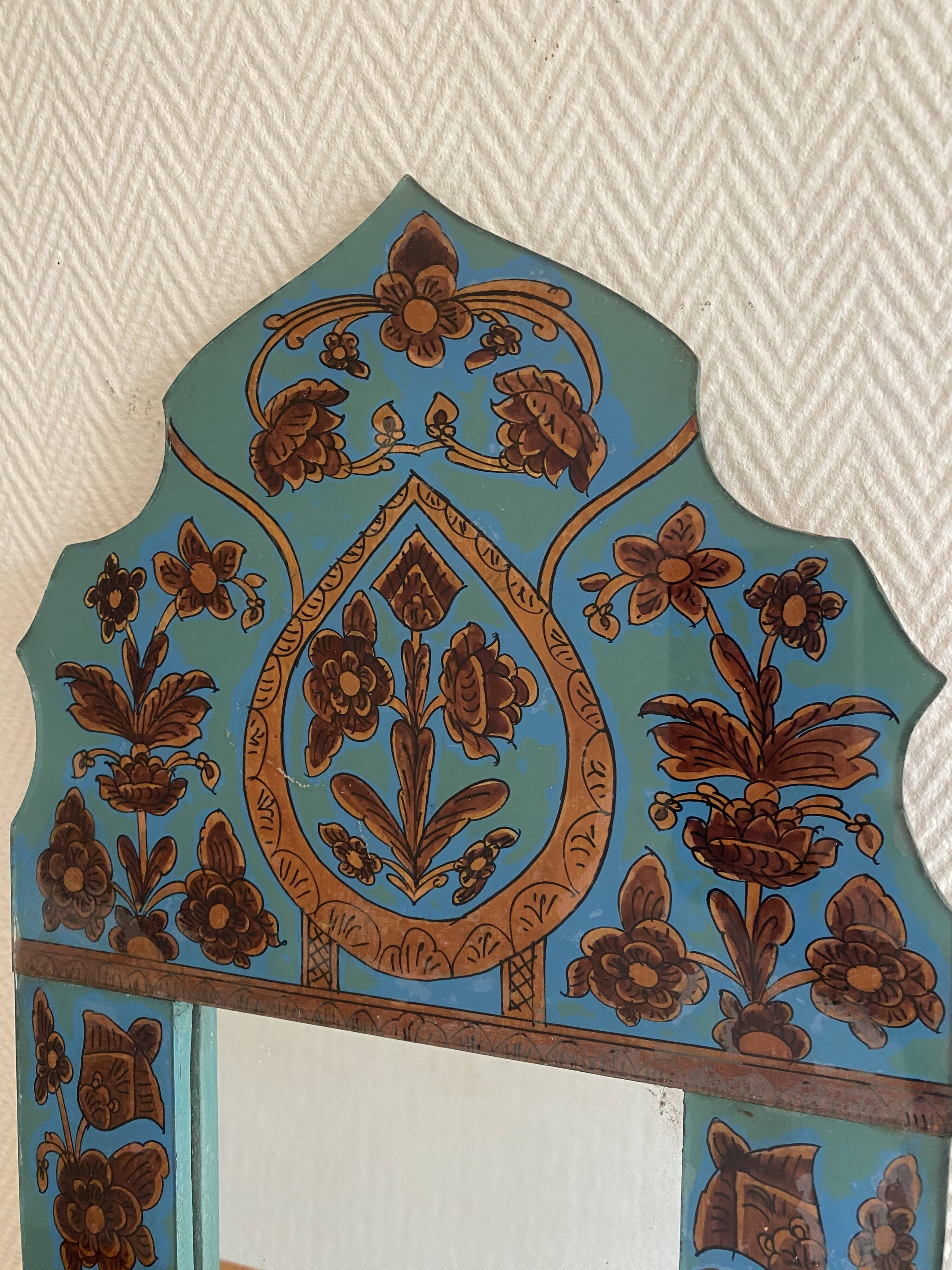 Vintage oriental wall mirror decor under glass