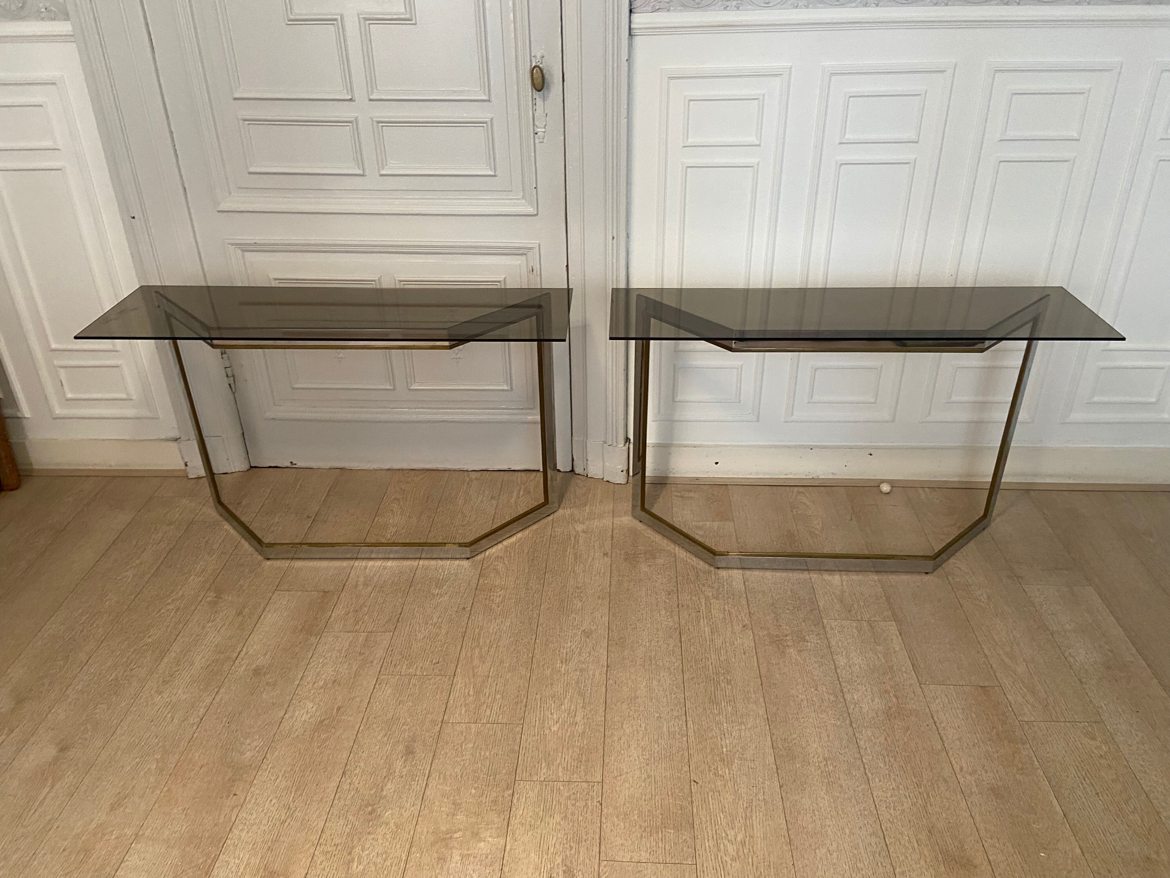 Pair of chrome metal consoles and smoked glass, Italy, 1970s