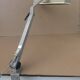 WALDMANN articulated workshop lamp with two industrial clamp arms for architects.