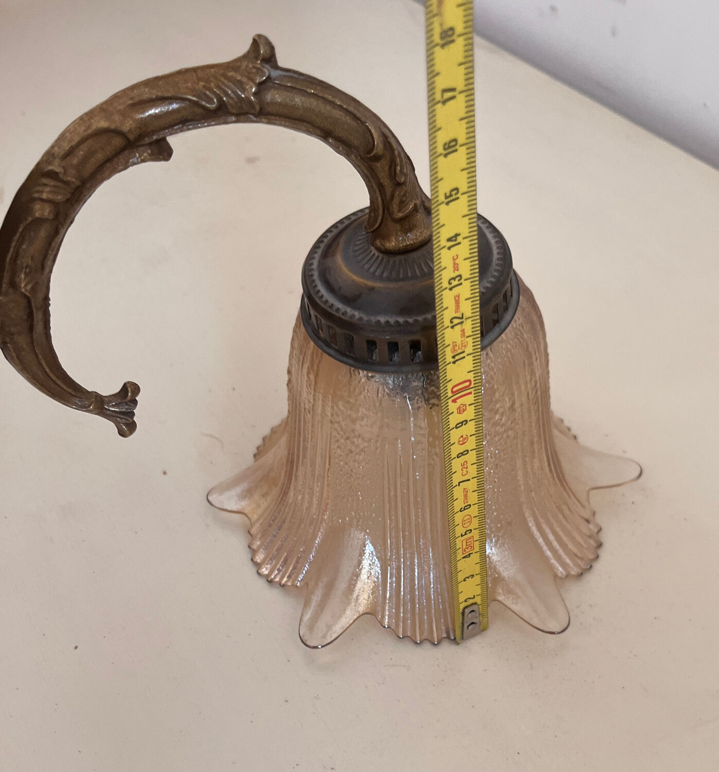 Old wall lamp with glass tulip
