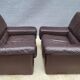 Pair of chocolate leather lounge chairs