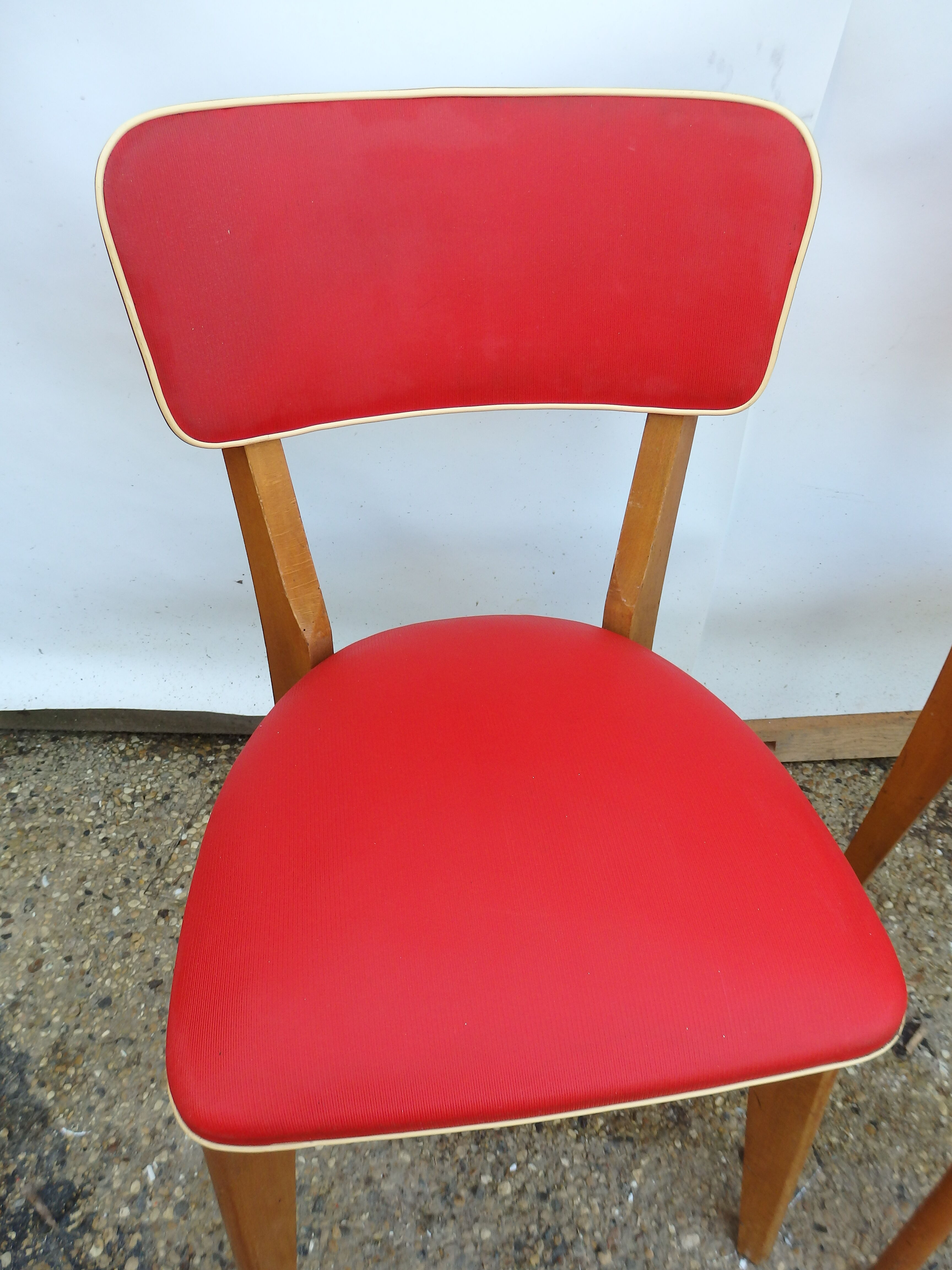 2 vintage red chairs
