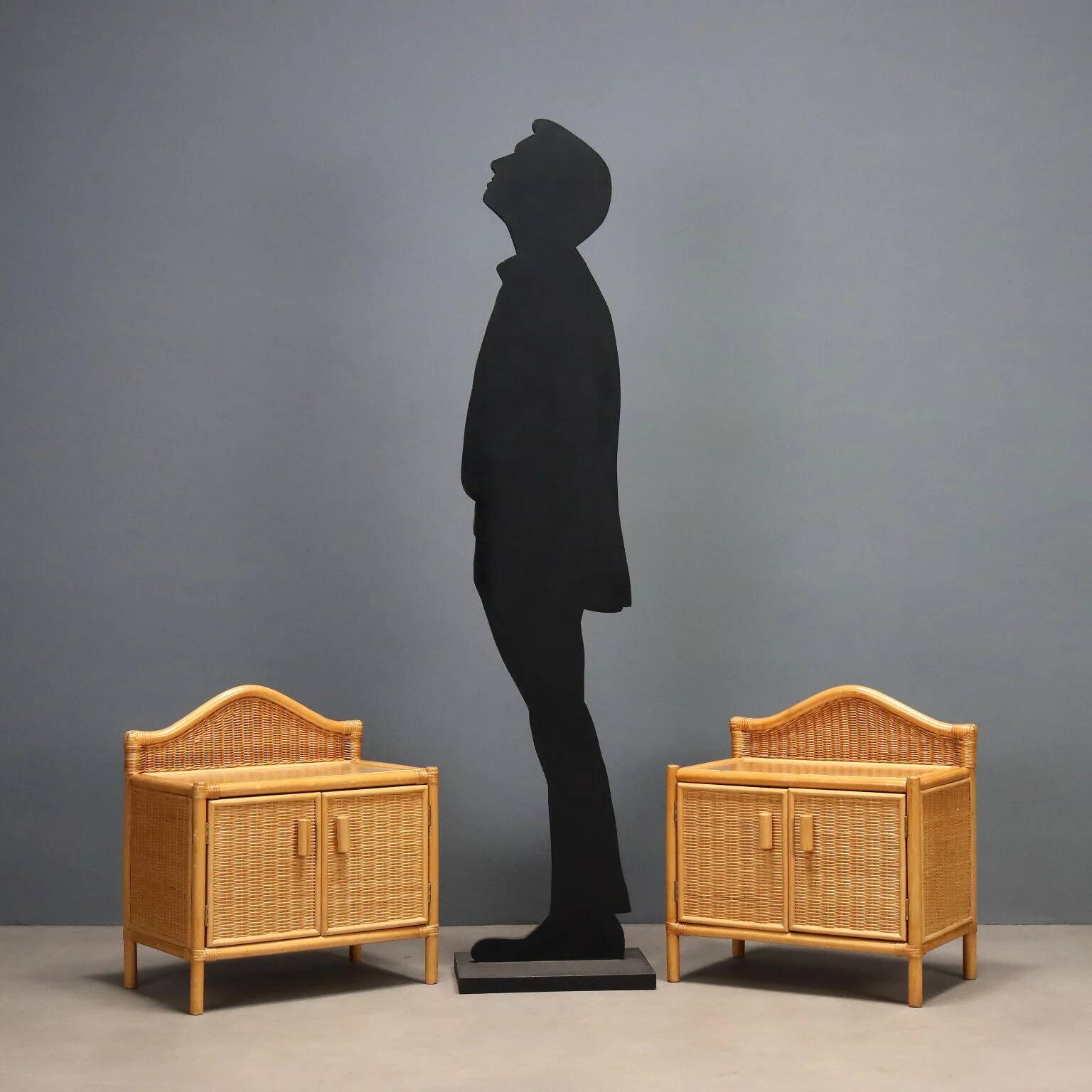 Pair of woven wicker bedside tables from the 1980s.