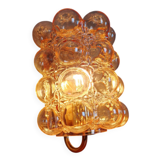 Amber bubbled glass wall light, design by Helena Tynell, Limburg, 1970.