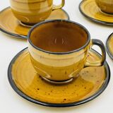 Set of four vintage Boch Palma cups and saucers.