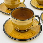 Set of four vintage Boch Palma cups and saucers.