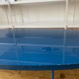 Oval coffee table in blue lacquered wood