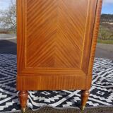 Louis XVI armoire with marquetry and gilded bronze
