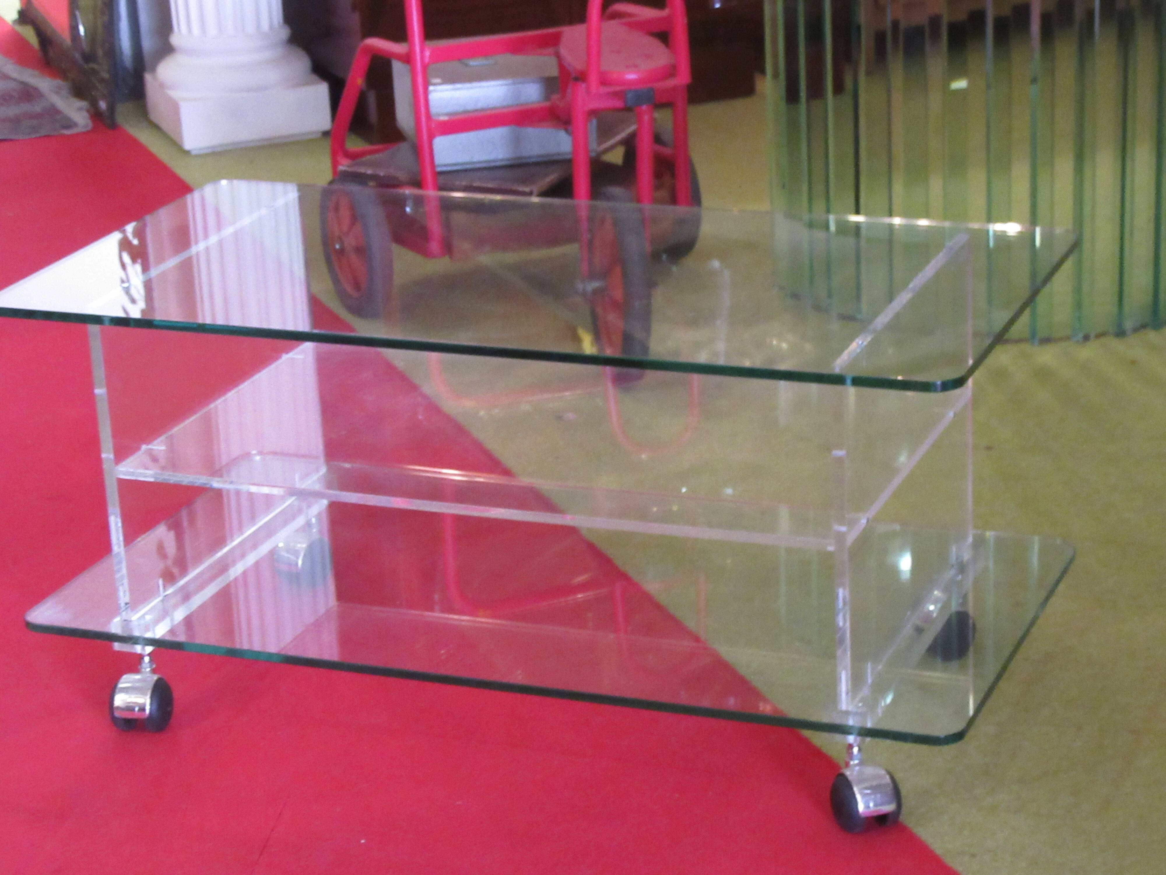 vintage glass coffee table with plexiglass legs
