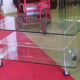 vintage glass coffee table with plexiglass legs