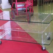 vintage glass coffee table with plexiglass legs