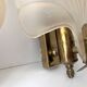 Pair of vintage shell glass wall lights, Art Deco style fixtures.