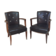 Paire de fauteuils en skai noir 1940