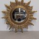 Gold metal sun mirror and witch's eye XL, Italy circa 1970.