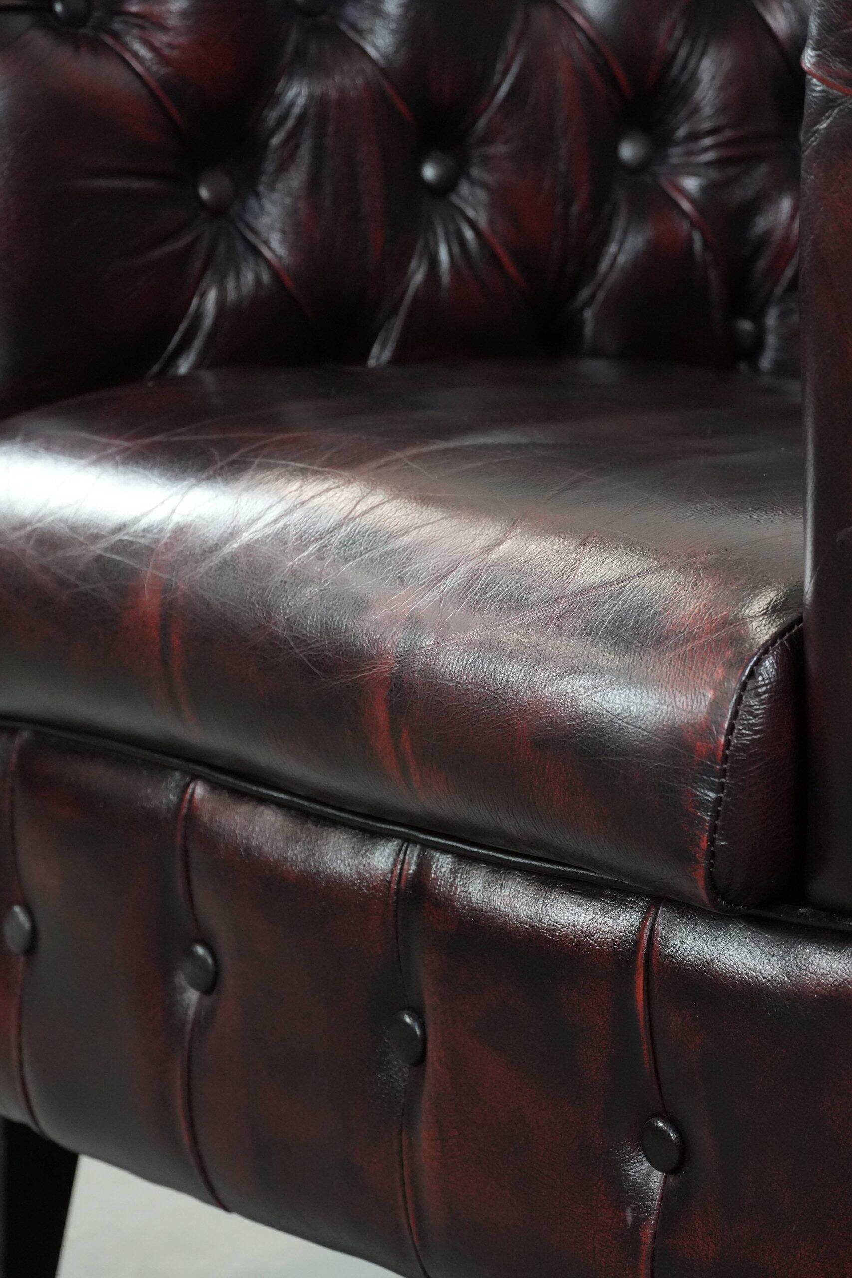 Cow leather Chesterfield club armchair in classic English style